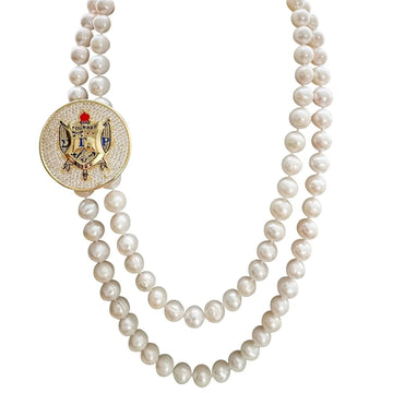 SGRho Shield Brooch on Double Strand Pearls